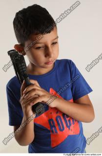 TIMBO STANDING POSE WITH GUN